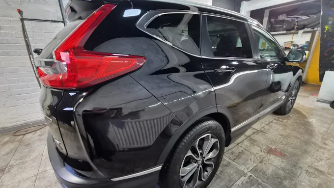 Honda CR-V ceramic coating rear three-quarter view in Warrington — gloss black finish at WCD Car Detailing WA5